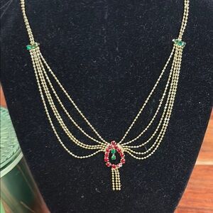 Elegant Gold and Red Necklace with Green Accents